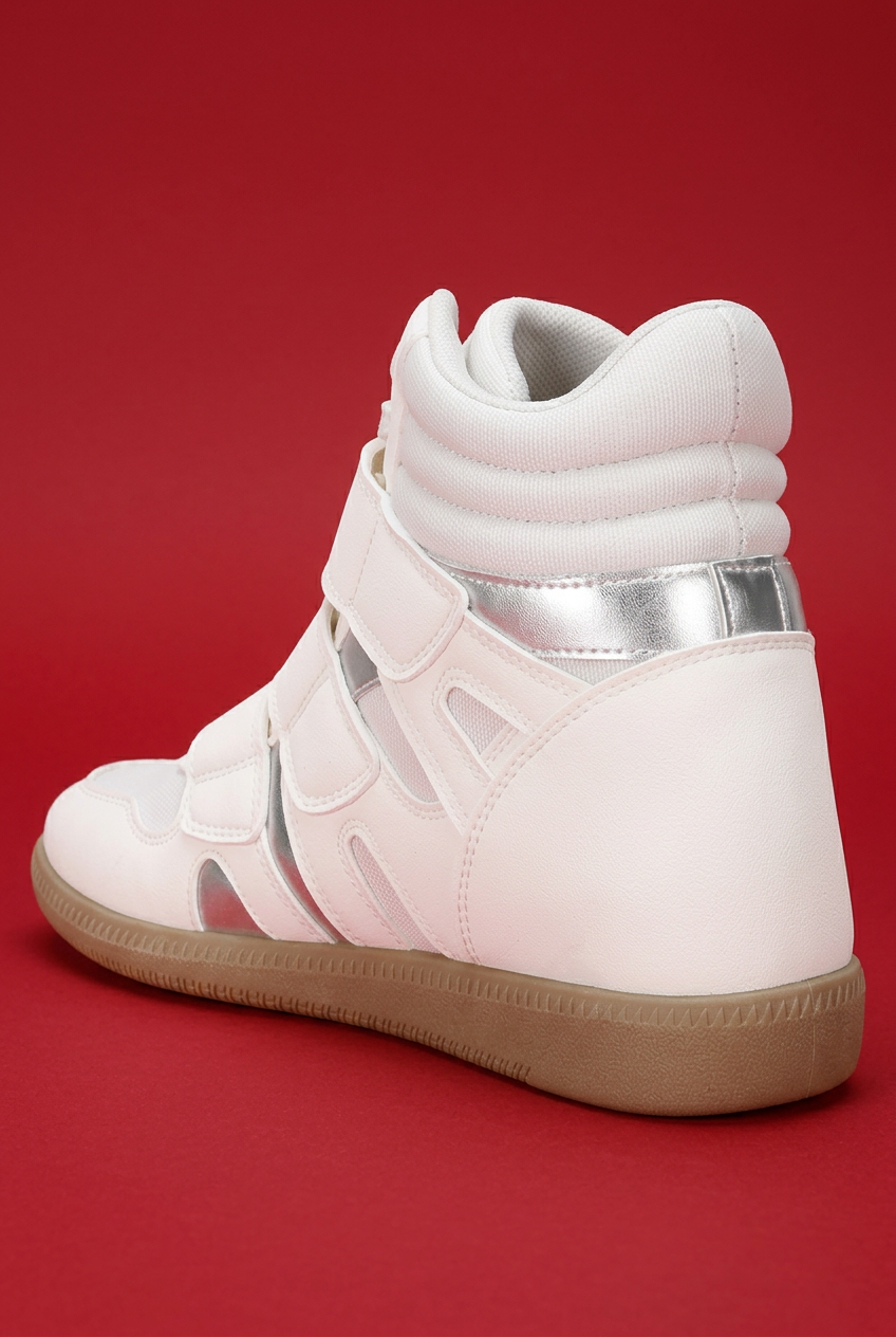 White high-top wedge sneaker rear angle on red background