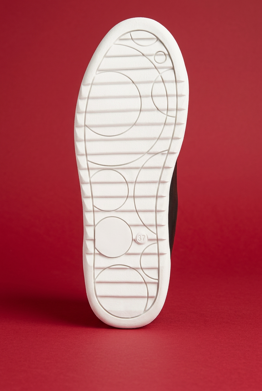 Sneaker sole with red background
